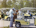 Men with Golf Carts at Marion Oaks Country Club by George Skip Gandy IV