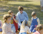 Children Sitting on Ground at Marion Oaks Country Club by George Skip Gandy IV