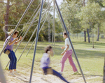 Children Playing on Playground Equipment at Marion Oaks Country Club, F by George Skip Gandy IV