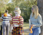 Woman Standing with Clown at Marion Oaks Country Club, A by George Skip Gandy IV
