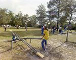 Children Playing on Playground Equipment at Marion Oaks Country Club, L by George Skip Gandy IV
