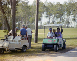 People with Golf Carts at Marion Oaks Country Club, G by George Skip Gandy IV