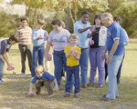 Children Holding Balloons at Marion Oaks Country Club, D by George Skip Gandy IV