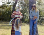 Woman Standing with Clown at Marion Oaks Country Club, C by George Skip Gandy IV