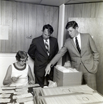 Woman and Two Men with Charge Slips for Master Charge by George Skip Gandy IV