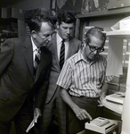 Three Men with Credit Card Machine for Master Charge, B by George Skip Gandy IV