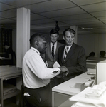 Three Men Standing Together for Master Charge, B by George Skip Gandy IV