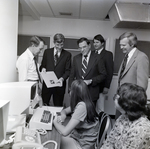 People Talking in Office for Master Charge, C by George Skip Gandy IV