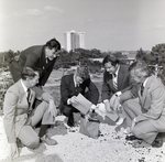 Men Crouching outside for Master Charge, A by George Skip Gandy IV