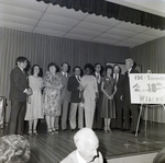 People on Stage with 10th Anniversary Sign for Master Charge, I by George Skip Gandy IV