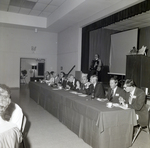 People Dining at Panel Table for Master Charge, A by George Skip Gandy IV