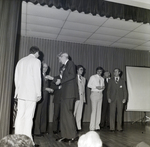 People on Stage for Master Charge, G by George Skip Gandy IV