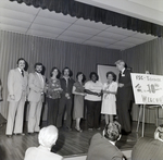 People on Stage with 10th Anniversary Sign for Master Charge, S by George Skip Gandy IV