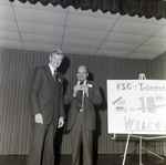 People on Stage with 10th Anniversary Sign for Master Charge, T by George Skip Gandy IV
