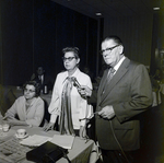 Woman Speaking at Table for Aero Mayflower Transit Company Incorporated, A by George Skip Gandy IV
