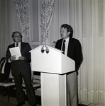 Man Speaking at Lectern at Memorial Hospital in Tampa, A by George Skip Gandy IV