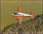 Twin Bonanza Plane Flies Over Marsh Landscape in Opa-locka, Florida, Y