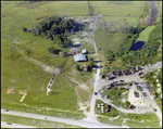 Farmland with Adjacent Construction Equipment Yard by Skip Gandy