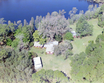 Lake and House on Nature Perserve, Near Tampa, Florida, C by Skip Gandy