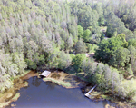 Lake and House on Nature Perserve, Near Tampa, Florida, D by Skip Gandy