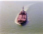 Tugboat Dixie Commander Pushing a Dredge on Open Waters, Tampa Bay, Florida, D by George Skip Gandy IV