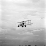 Biplane in Flight, Tampa, Florida, A by George Skip Gandy IV