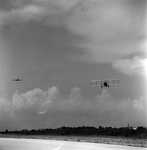 Biplane and Commercial Airplane Flying, Tampa, Florida by George Skip Gandy IV