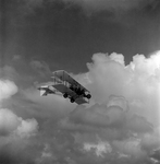 Biplane with Pilot and Passenger in Flight, Tampa, Florida, B by George Skip Gandy IV