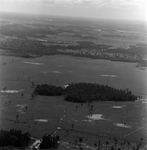 Aerial View of Flying Aircraft over Rural Landscape, Tampa, Florida, C by George Skip Gandy IV