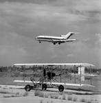 Eastern Air Lines Jet and Biplane on Runway, Tampa, Florida by George Skip Gandy IV