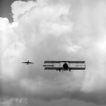 Biplane and Commercial Airplane in Flight, Tampa, Florida, A by George Skip Gandy IV