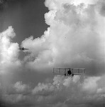 Biplane and Commercial Airplane in Flight, Tampa, Florida, B by George Skip Gandy IV