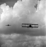 Biplane and Commercial Airplane in Flight, Tampa, Florida, C by George Skip Gandy IV