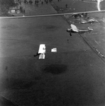 Two Aircraft Flying Over Rural Landscape, Tampa, Florida, B by George Skip Gandy IV