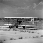 Biplane Parked on Airfield, Tampa, Florida by George Skip Gandy IV