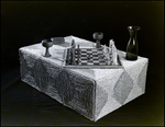 Wicker Cube Holds Glassware and Chess Set