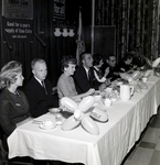 Humble Oil and Refinery Company Men and Women Sitting at Table, Tampa by George Skip Gandy IV