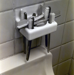 Exchange National Bank Ad Toothbrush Holder and Brushes, A by George Skip Gandy IV