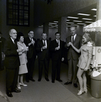 Exchange National Bank People Drinking from Orange Juice Stand, Tampa by George Skip Gandy IV