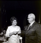 Exchange National Bank Woman Being Handed a Lapel Pin, Tampa by George Skip Gandy IV