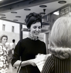 Company Representative Speaks to Woman on Street, Exchange National Bank by George Skip Gandy IV