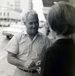 Company Representative Speaks to Man on Street, Exchange National Bank by George Skip Gandy IV