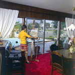 Woman Painting a Canvas Near Pool, Exchange National Bank by George Skip Gandy IV