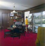 Woman Painting a Canvas Near Pool, Exchange National Bank by George Skip Gandy IV