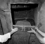 Hands Holding a Cut Metal Section, A by George Skip Gandy IV