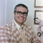 Person Inspecting Jewelry at Alvin Magnon Jewelers, Tampa, O by George Skip Gandy IV