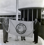 Men Holding Flag Outside Metropolitan Life Insurance Building by George Skip Gandy IV