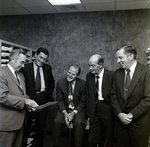 Mr. Lynch Looking at Papers in Metropolitan Life Insurance Building, C by George Skip Gandy IV