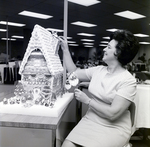Woman Sitting by Gingerbread House at Metropolitan Life Insurance Building, C by George Skip Gandy IV