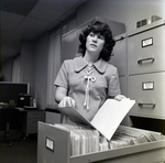 Woman Checking Personnel Division Files at Metropolitan Life, D by George Skip Gandy IV